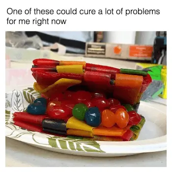 A plate of colorful Gushers inside melted Gushers like a sandwich with the text reading, "One of these could cure a lot of problems for me right now" - Link to social post